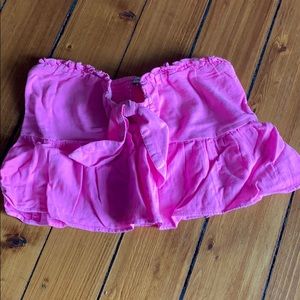 Bright pink strapless crop top